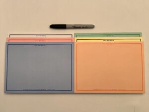 A SIX-COLOR Set of VIS-IT™ 8x6 in. Big Idea Pads (300 sheets total) with a marker on them.