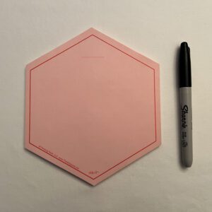A RED VIS-IT™ Hexagon Pad 6x6 in. (50 sheets) next to a marker.